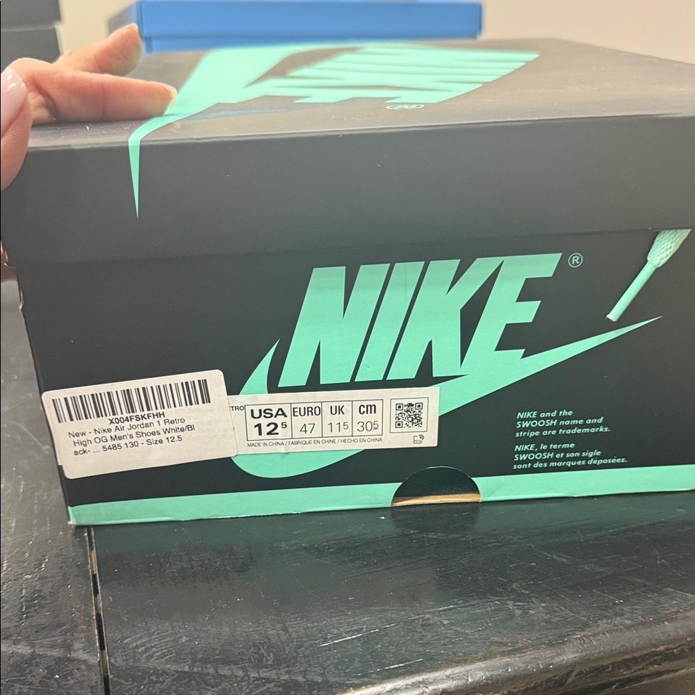 Nike Black and Teal Logo Shoe Box